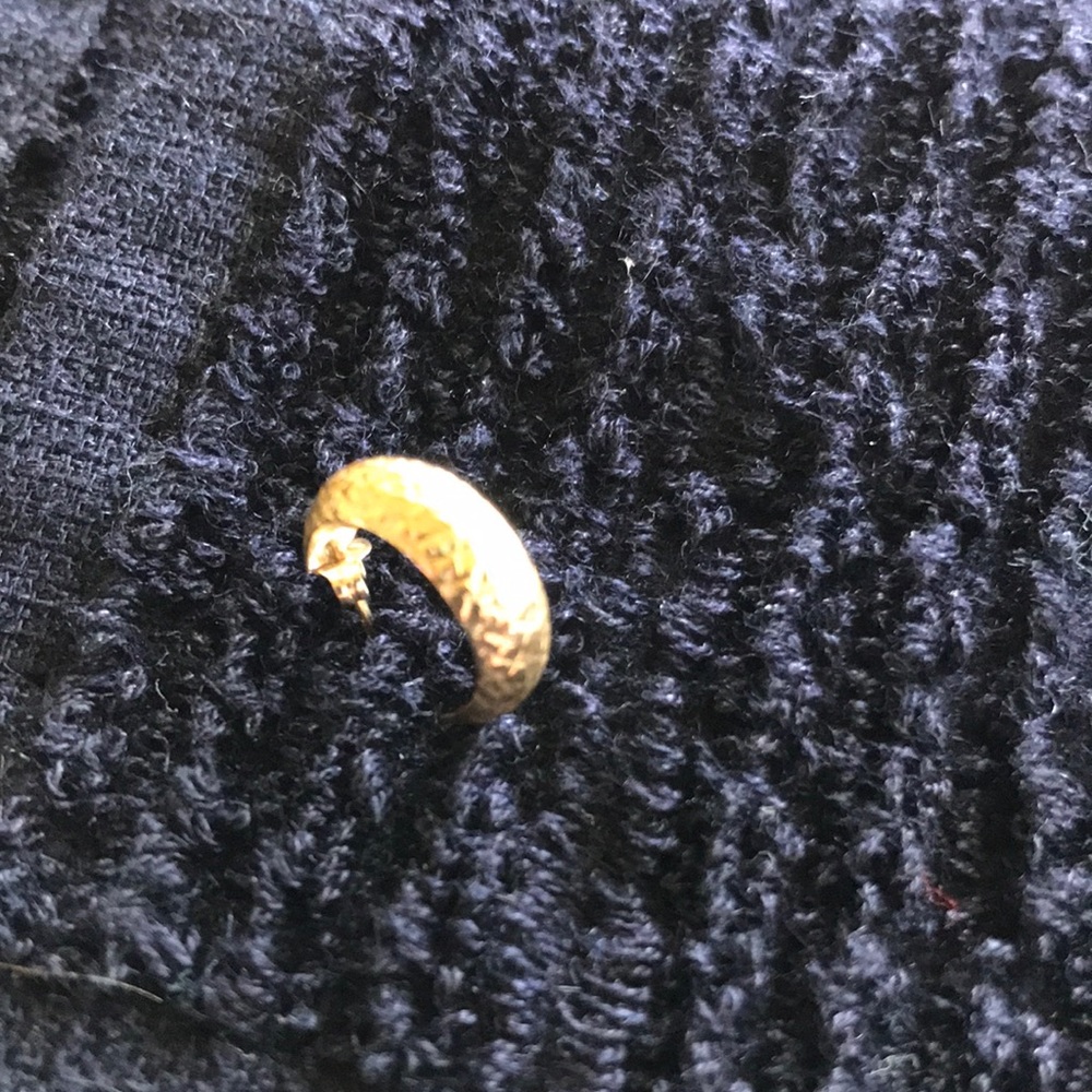 Single gold hoop earring